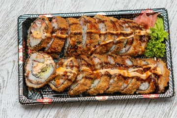 Sushi and rolls, Japanese sea cuisine,Dragon Rolls at home,  Roll is another popular sushi roll serve,