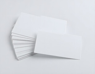 Blank Business Cards Stacked on a Gray Background for Customization