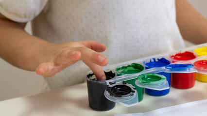 Happy Toddler Girl with Colorful Painted Hands - Creative Mess, Childhood Fun and Art Education Concept