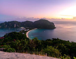 Scenic View of Tropical Island at Sunset with Calm Ocean Waters