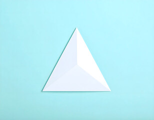 Fototapeta premium Minimalist White Paper Triangle on Soft Blue Background