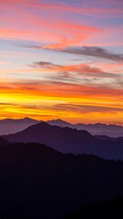 Fototapeta premium Sunrise over mountain ranges