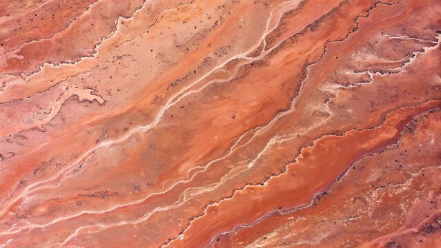 Elegante Texture di Marmo Rosso con Venature Astratte per Sfondi di Lusso