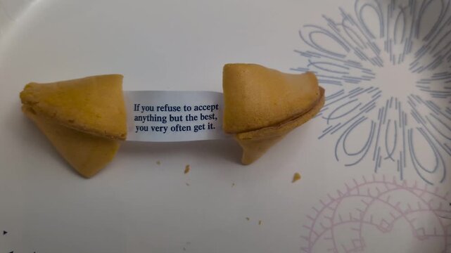 Crescent City, CA &ndash; August 25, 2025 
Time-lapse/Slow-motion closeup of an inspiring fortune cookie message: "If you refuse to accept nothing but the best you often get it." Visual metaphor for high