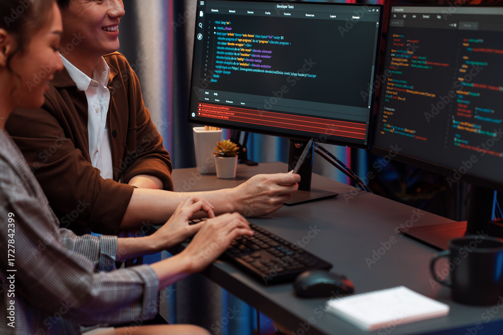 Wall mural it developers discussing with point to intelligent website development coder system running data onl