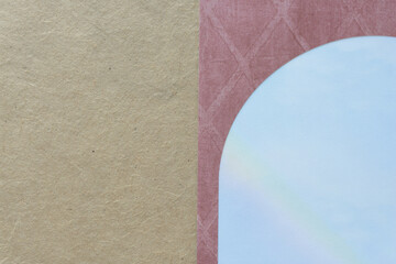 plain brown paper and arch with sky blue