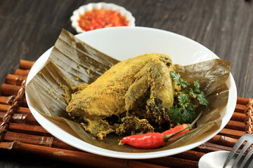 Steamed Chicken, with Basil Leaf and Chilli Wrapped with Banana Leaf
