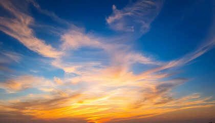 Obraz premium Sunset With Cirrus Clouds Beautiful Cloud Patterns At Dusk Sunrise Orange Clouds In The Sky Sky Background Sky Gradient Twilight Heaven Nature Blue Sky