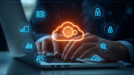 The futuristic laptop keyboard features digital interface icons showcasing modern business technology, digital transformation, cybersecurity, cloud computing, data storage, security, analytics, and te
