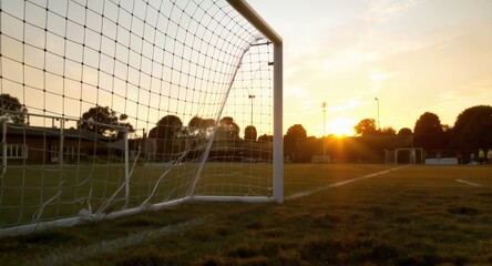 Empty Football Field During a Golden Sunset.