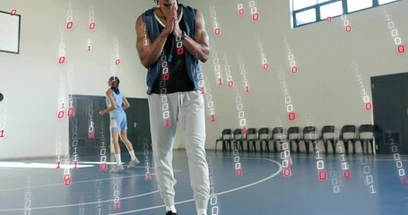 Gym trainer clapping initiating drill, binary overlay streaming and athlete jogging with basketball - Powered by Adobe