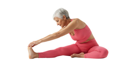 Senior woman doing yoga, stretching her leg and touching her foot.