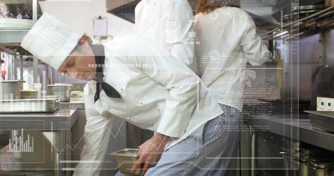 Central chef placing pan triggers chefs loading ovens and stirring batter for plating in kitchen