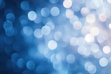 Obraz premium abstract background of soft blue and white blurred light circles creating a calming and dreamy atmosphere