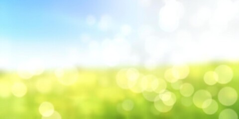 Obraz premium Soft focus green field under bright blue sky with sun flare