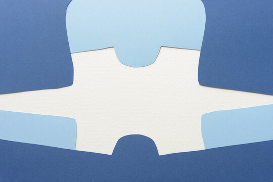 abstract cut paper shapes forming a puzzle shape  - Powered by Adobe