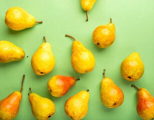 Pears arranged on a lime green background