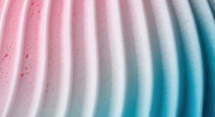 Abstract closeup of a textured surface with wavy lines transitioning from pink to white and then to blue, creating a soft gradient effect