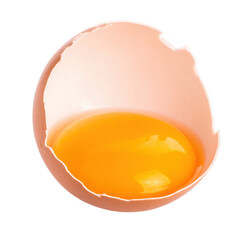 Close-up of a cracked egg shell revealing a vibrant yolk against a black background.