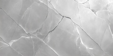 close-up view of a smooth gray marble surface with white and dark natural veins creating an abstract pattern and texture