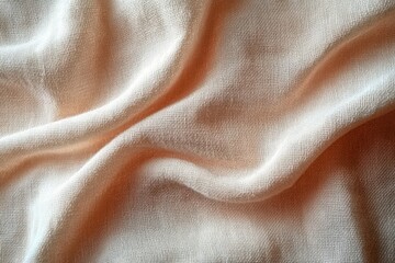 Close-up of soft beige fabric with delicate weaving and gentle folds creating a smooth and calming texture