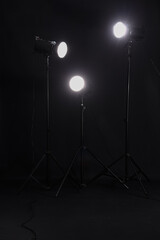 Glowing studio light on black background