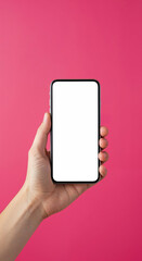 Mobile Tech in Hand: A hand delicately holds a modern smartphone against a vibrant pink backdrop, emphasizing the sleek technology of the device.