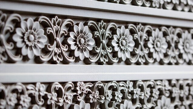 Ornate floral plasterwork with scrolling tendrils and textured s