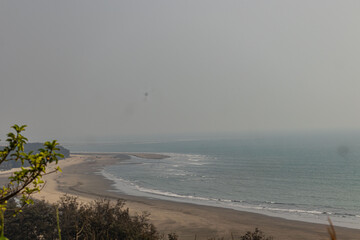 View of the unspoiled coastal stretch of Cox's Bazar beach, offering stunning natural beauty, Bangladesh.