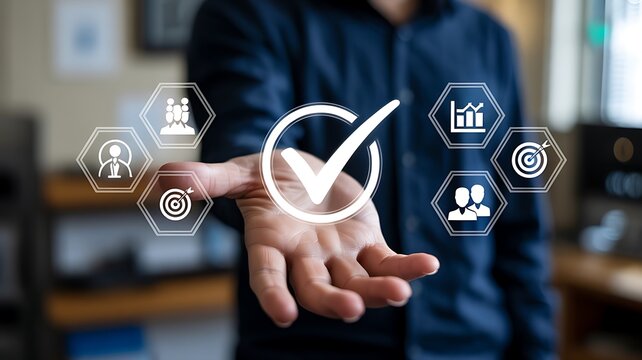 Businessman presenting business success concept represented by a checkmark with icons related to business development and team work.