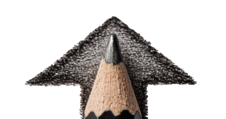Close-up of a sharpened pencil angled upwards, showing graphite shavings