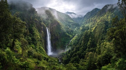 Majestic waterfall in lush valley