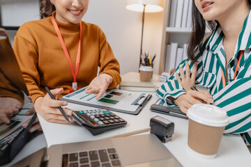 A group of professionals engaged in a collaborative business meeting, exchanging innovative ideas and strategies to build growth and success in a modern startup environment.