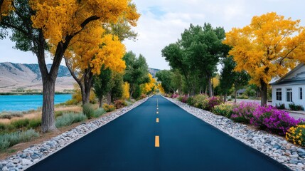 Obraz premium Scenic Autumn Road Tunnel with Golden Trees and Mountain Views in Distance Tranquil Landscape with Vibrant Foliage and Clear Blue Sky for Peaceful Scenery