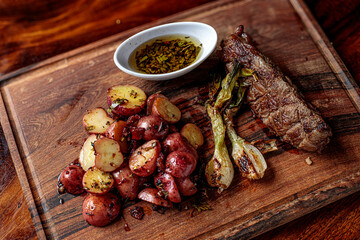 Picaña steak, accompanied by sautéed cambray potatoes and chimichurri