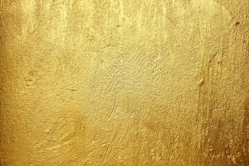 Gold Paint on Grunge Concrete Wall Texture Background.