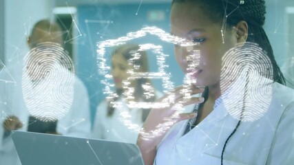 Woman doctor tapping trackpad securing patient data as glowing streams forming locked shield - Powered by Adobe