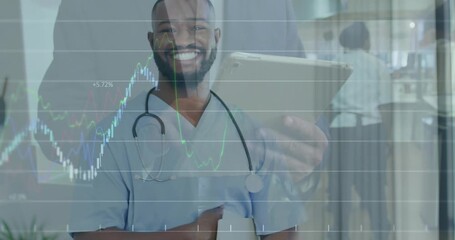 Doctor tapping tablet screen for monitoring financial charts and accepting handheld medical device - Powered by Adobe