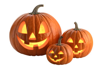 Three carved pumpkins with glowing faces isolated on transparent background