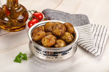 Baked mini potato with herbs