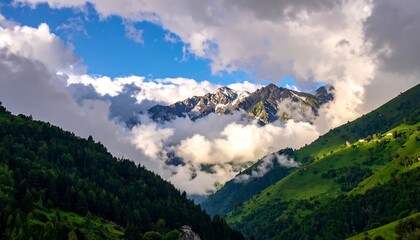 Mountain valley shrouded in clouds