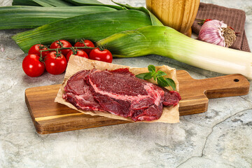 Raw beef cheeks cut for cooking
