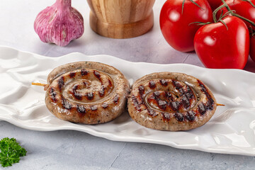 Grilled beef round circle sausages
