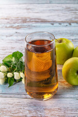 Apple yellow juice in the glass