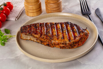 Grilled pork steak with bone