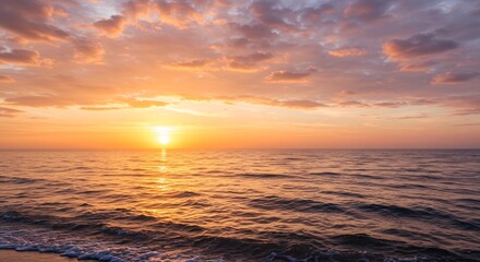 Obraz premium 水平線に沈む太陽が海を黄金色に染め上げるドラマチックな夕焼け風景 温かい光が雲と波を照らし出し息をのむ絶景が広がる. AI Generated