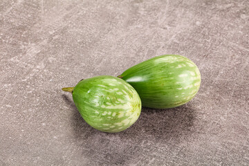 Ripe green mini eggplants heap