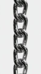 Obraz premium Shiny Silver Chain Link on White Background for Industrial and Creative Use