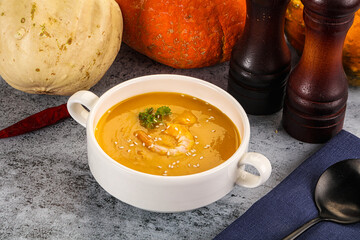 Pumpkin cream soup with prawns