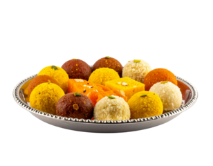 Assortment of colorful indian sweets on a silver tray isolated on transparent background, perfect for festive occasions and celebrations
